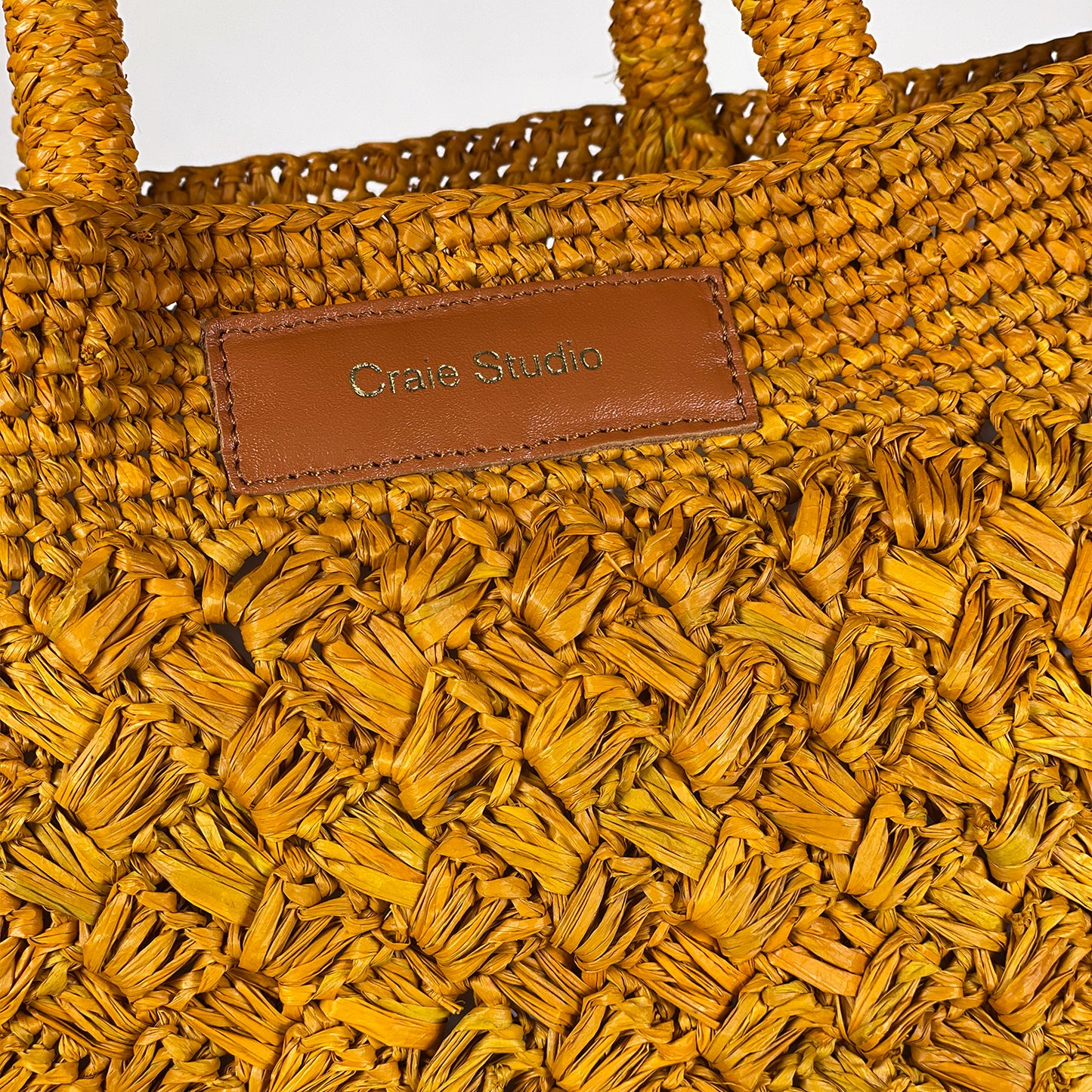 Golden Raffia Duffel Bag
