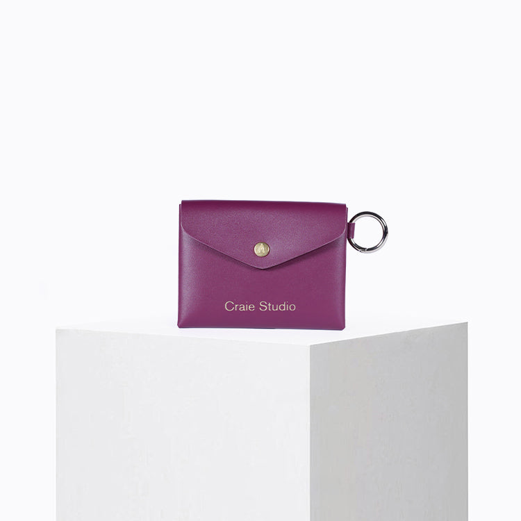 Pochette Pochi en cuir Berry